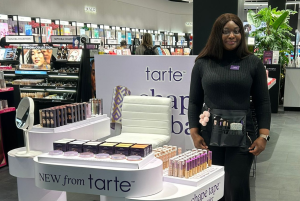 Image of Ella, Fortem & Mode Consultant on the Tarte Cosmetics counter.